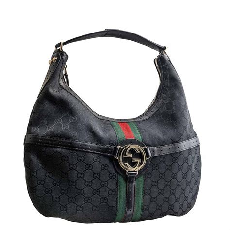 black embossed gucci bag|Gucci monogram shoulder bag.